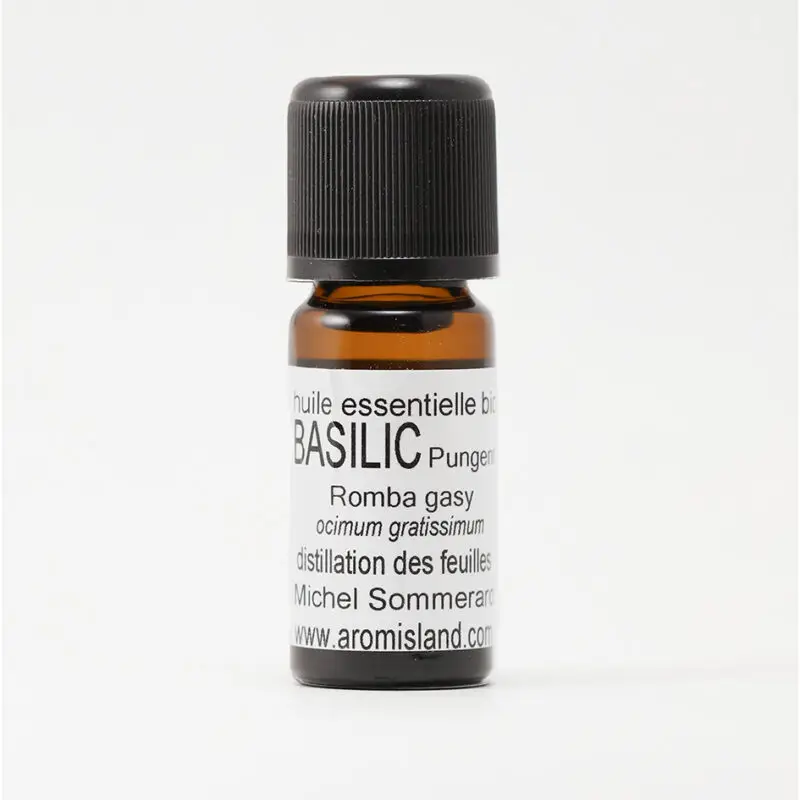 Flacon d' Huile Essentielle de Basilic Pungent Bio ( Ocimum gratissimum ) , distillation pure et biologique.