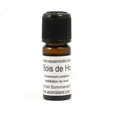 Flacon d' Huile Essentielle de Bois de Hô Bio ( Cinnamomum camphora ) , distillation pure et biologique.
