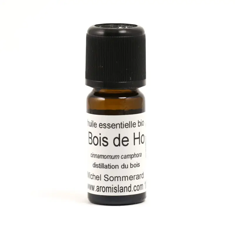 Flacon d' Huile Essentielle de Bois de Hô Bio ( Cinnamomum camphora ) , distillation pure et biologique.