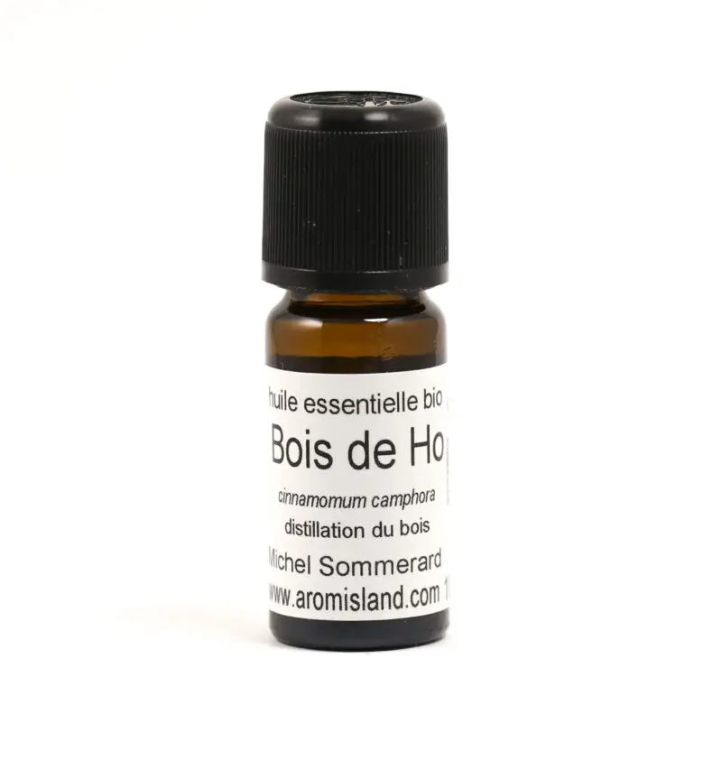 Flacon d' Huile Essentielle de Bois de Hô Bio ( Cinnamomum camphora ) , distillation pure et biologique.