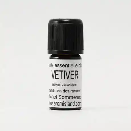 Flacon d' Huile Essentielle de Vétiver Bio Vetiveria zizanoïdes , extrait pur et épais des racines du vétiver.