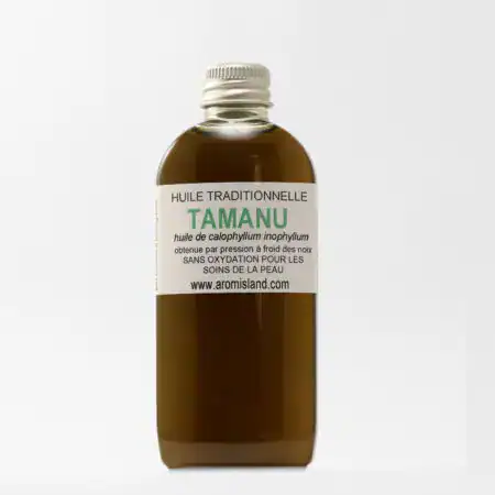 Huile de Tamanu vert pressée à froid dans un flacon