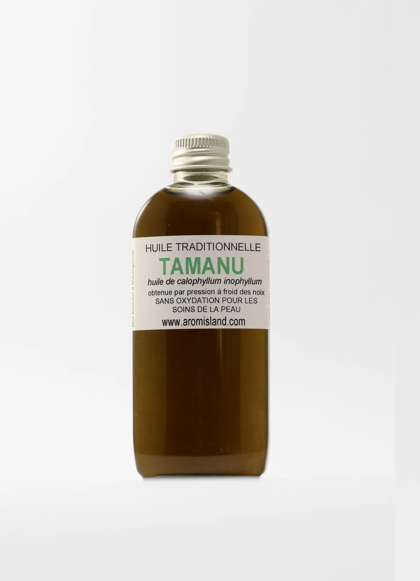 Huile de Tamanu vert pressée à froid dans un flacon