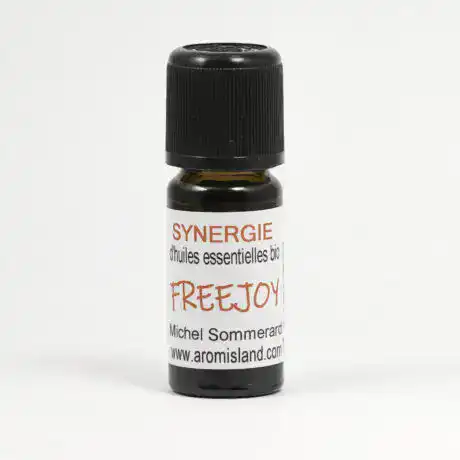 Flacon de Synergie Freejoy Plaisir et Liberté, mélange d’huiles essentielles bio aux notes pétillantes et sensuelles.